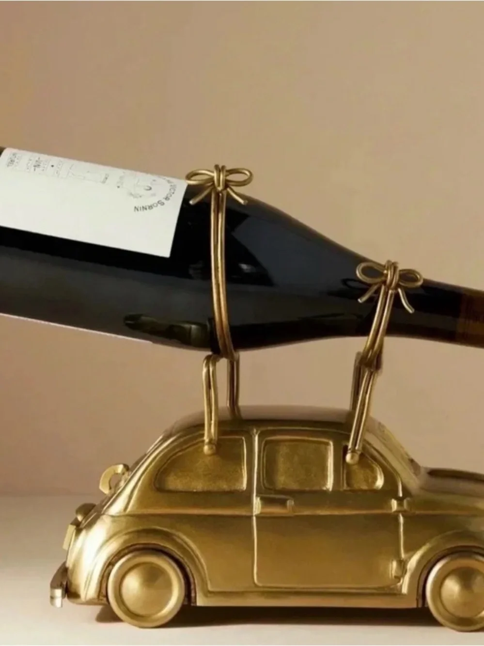 Anthropologie Brass Cast Car Bottle Holder